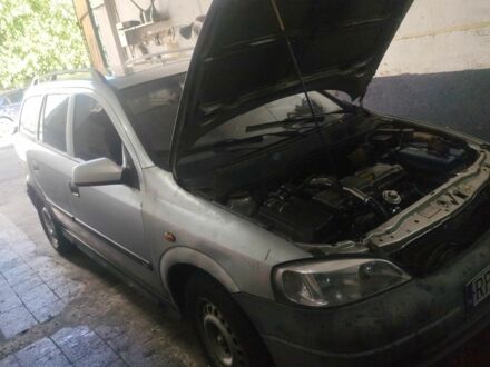 Серый Опель Астра, объемом двигателя 2 л и пробегом 380 тыс. км за 1299 $, фото 1 на Automoto.ua