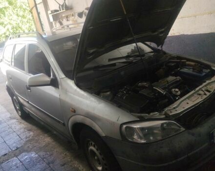 Серый Опель Астра, объемом двигателя 2 л и пробегом 380 тыс. км за 1400 $, фото 1 на Automoto.ua