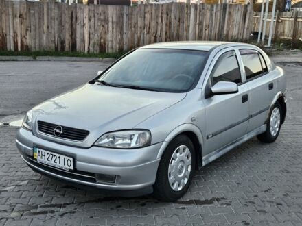 Серый Опель Астра, объемом двигателя 1.4 л и пробегом 290 тыс. км за 1800 $, фото 1 на Automoto.ua