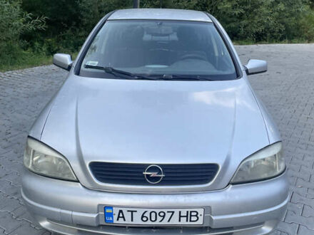 Серый Опель Астра, объемом двигателя 2 л и пробегом 326 тыс. км за 2100 $, фото 1 на Automoto.ua
