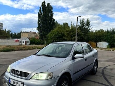 Серый Опель Астра, объемом двигателя 1.4 л и пробегом 200 тыс. км за 2399 $, фото 1 на Automoto.ua