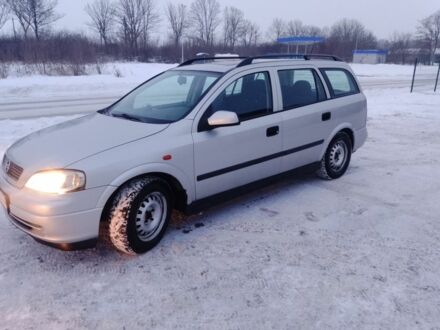 Серый Опель Астра, объемом двигателя 1 л и пробегом 222 тыс. км за 1850 $, фото 1 на Automoto.ua