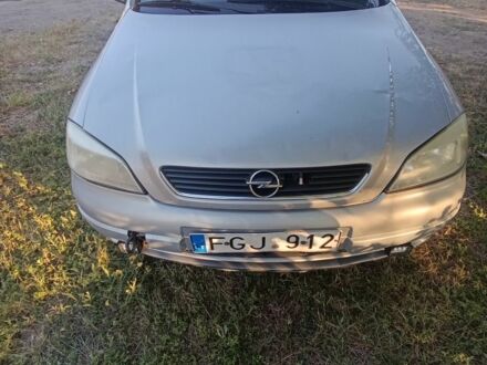 Серый Опель Астра, объемом двигателя 2 л и пробегом 300 тыс. км за 850 $, фото 1 на Automoto.ua