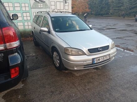 Серый Опель Астра, объемом двигателя 2 л и пробегом 320 тыс. км за 1350 $, фото 1 на Automoto.ua