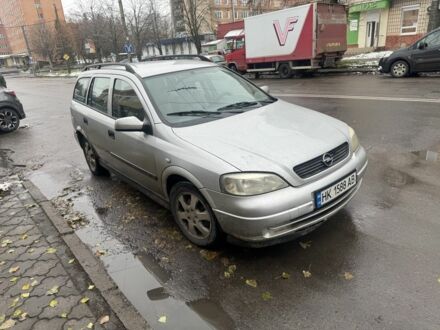 Серый Опель Астра, объемом двигателя 2 л и пробегом 370 тыс. км за 1550 $, фото 1 на Automoto.ua