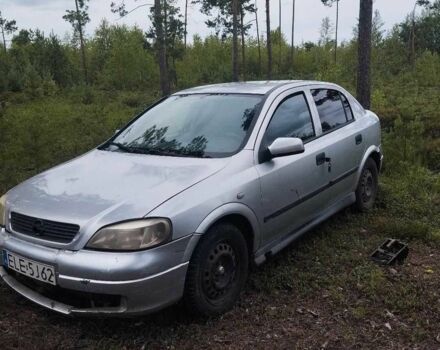 Серый Опель Астра, объемом двигателя 2 л и пробегом 260 тыс. км за 600 $, фото 1 на Automoto.ua