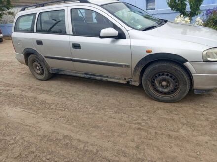 Серый Опель Астра, объемом двигателя 2 л и пробегом 240 тыс. км за 2000 $, фото 1 на Automoto.ua