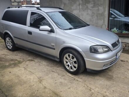 Серый Опель Астра, объемом двигателя 1.7 л и пробегом 324 тыс. км за 3500 $, фото 1 на Automoto.ua