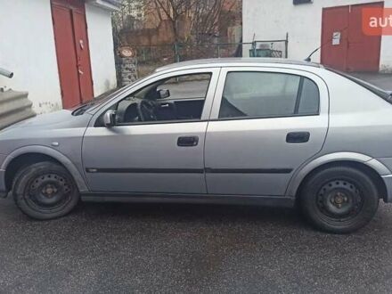 Серый Опель Астра, объемом двигателя 1.6 л и пробегом 214 тыс. км за 3400 $, фото 1 на Automoto.ua