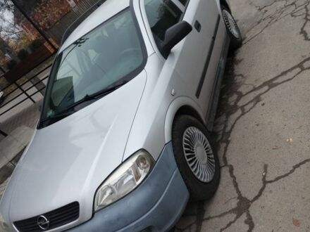 Серый Опель Астра, объемом двигателя 1.4 л и пробегом 250 тыс. км за 2399 $, фото 1 на Automoto.ua