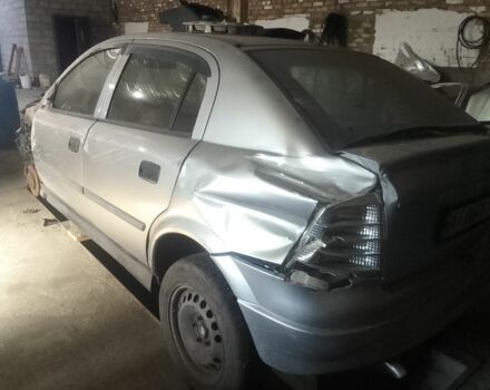 Серый Опель Астра, объемом двигателя 2 л и пробегом 230 тыс. км за 1000 $, фото 1 на Automoto.ua