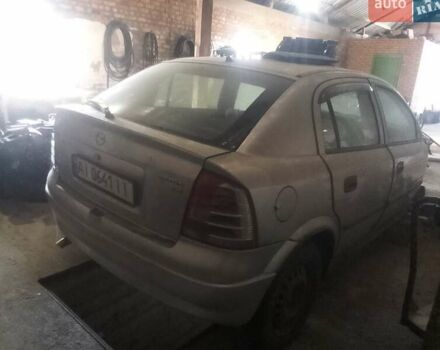 Серый Опель Астра, объемом двигателя 2 л и пробегом 230 тыс. км за 1000 $, фото 1 на Automoto.ua