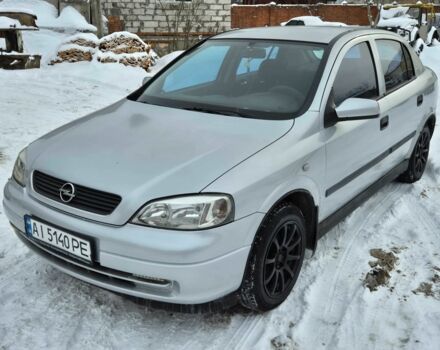 Серый Опель Астра, объемом двигателя 1.2 л и пробегом 230 тыс. км за 2250 $, фото 1 на Automoto.ua