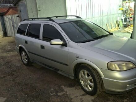 Серый Опель Астра, объемом двигателя 2 л и пробегом 375 тыс. км за 3500 $, фото 1 на Automoto.ua