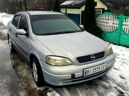 Серый Опель Астра, объемом двигателя 1.4 л и пробегом 295 тыс. км за 3100 $, фото 1 на Automoto.ua