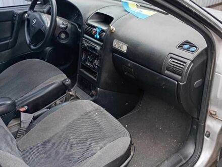 Серый Опель Астра, объемом двигателя 1.6 л и пробегом 236 тыс. км за 1500 $, фото 1 на Automoto.ua