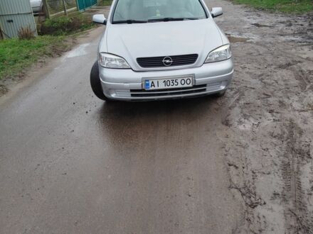 Серый Опель Астра, объемом двигателя 1.2 л и пробегом 249 тыс. км за 2400 $, фото 1 на Automoto.ua