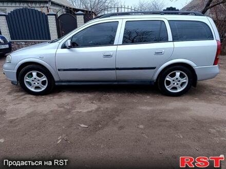 Серый Опель Астра, объемом двигателя 2 л и пробегом 290 тыс. км за 3500 $, фото 1 на Automoto.ua