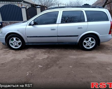 Серый Опель Астра, объемом двигателя 2 л и пробегом 290 тыс. км за 3500 $, фото 1 на Automoto.ua