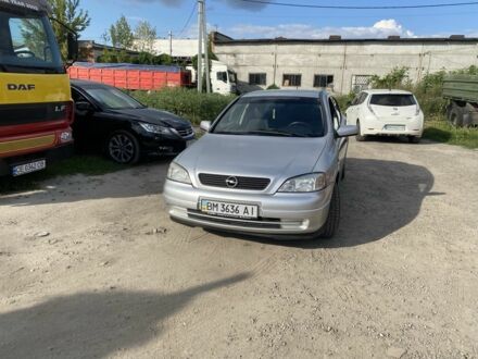 Серый Опель Астра, объемом двигателя 1.4 л и пробегом 222 тыс. км за 3600 $, фото 1 на Automoto.ua