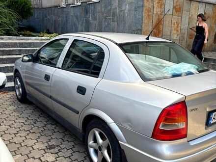 Серый Опель Астра, объемом двигателя 1.4 л и пробегом 300 тыс. км за 3100 $, фото 1 на Automoto.ua