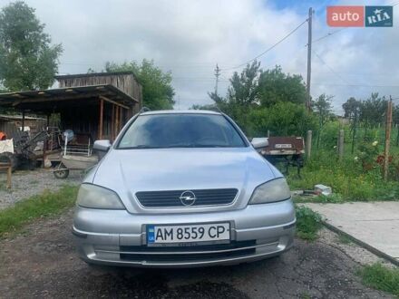 Серый Опель Астра, объемом двигателя 1.6 л и пробегом 242 тыс. км за 3800 $, фото 1 на Automoto.ua