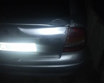 Серый Опель Астра, объемом двигателя 1.6 л и пробегом 280 тыс. км за 1450 $, фото 1 на Automoto.ua