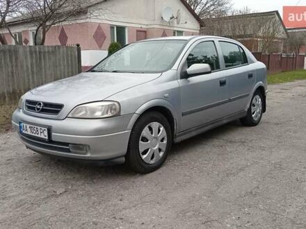 Серый Опель Астра, объемом двигателя 1.6 л и пробегом 300 тыс. км за 1950 $, фото 1 на Automoto.ua