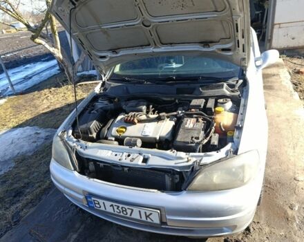 Серый Опель Астра, объемом двигателя 1.6 л и пробегом 321 тыс. км за 3500 $, фото 1 на Automoto.ua