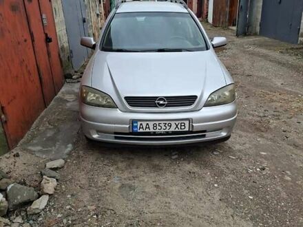 Серый Опель Астра, объемом двигателя 1.69 л и пробегом 310 тыс. км за 3100 $, фото 1 на Automoto.ua