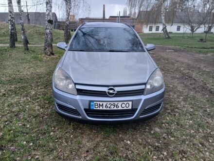 Серый Опель Астра, объемом двигателя 1.6 л и пробегом 242 тыс. км за 5000 $, фото 1 на Automoto.ua
