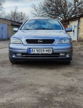 Серый Опель Астра, объемом двигателя 1.39 л и пробегом 330 тыс. км за 3400 $, фото 1 на Automoto.ua