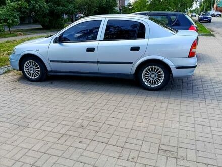 Серый Опель Астра, объемом двигателя 1.4 л и пробегом 246 тыс. км за 3500 $, фото 1 на Automoto.ua