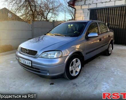 Серый Опель Астра, объемом двигателя 1.6 л и пробегом 265 тыс. км за 2999 $, фото 1 на Automoto.ua