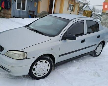 Серый Опель Астра, объемом двигателя 1.6 л и пробегом 231 тыс. км за 2400 $, фото 1 на Automoto.ua