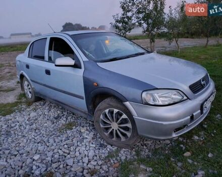 Серый Опель Астра, объемом двигателя 1.6 л и пробегом 289 тыс. км за 1300 $, фото 1 на Automoto.ua
