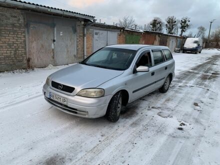 Серый Опель Астра, объемом двигателя 1.2 л и пробегом 250 тыс. км за 1800 $, фото 1 на Automoto.ua