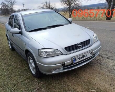 Серый Опель Астра, объемом двигателя 1.4 л и пробегом 299 тыс. км за 1000 $, фото 1 на Automoto.ua