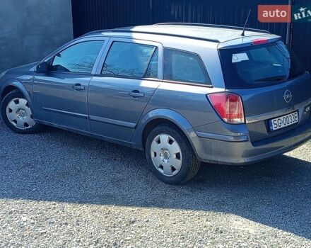 Серый Опель Астра, объемом двигателя 1.9 л и пробегом 300 тыс. км за 1750 $, фото 1 на Automoto.ua