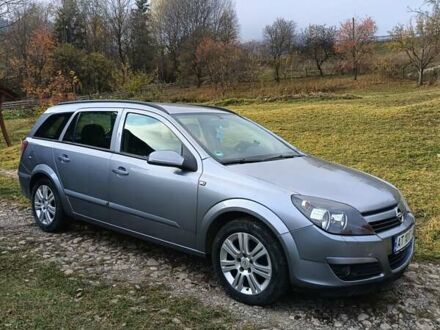 Серый Опель Астра, объемом двигателя 1.4 л и пробегом 250 тыс. км за 4000 $, фото 1 на Automoto.ua