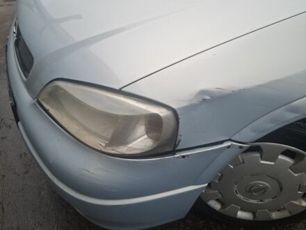 Серый Опель Астра, объемом двигателя 1.4 л и пробегом 400 тыс. км за 2500 $, фото 1 на Automoto.ua