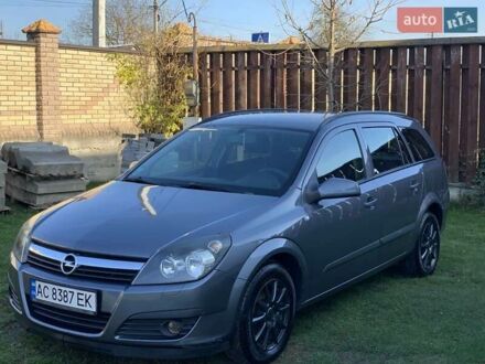 Серый Опель Астра, объемом двигателя 1.6 л и пробегом 256 тыс. км за 4555 $, фото 1 на Automoto.ua