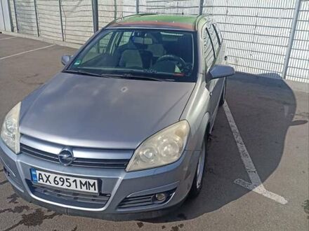 Серый Опель Астра, объемом двигателя 1.6 л и пробегом 230 тыс. км за 5700 $, фото 1 на Automoto.ua