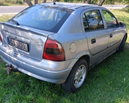 Серый Опель Астра, объемом двигателя 2 л и пробегом 190 тыс. км за 1400 $, фото 1 на Automoto.ua