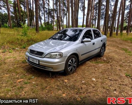 Серый Опель Астра, объемом двигателя 1.6 л и пробегом 248 тыс. км за 2250 $, фото 1 на Automoto.ua