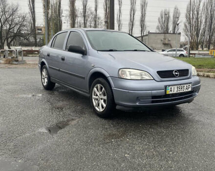 Серый Опель Астра, объемом двигателя 1.4 л и пробегом 283 тыс. км за 3200 $, фото 1 на Automoto.ua