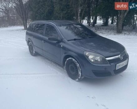 Серый Опель Астра, объемом двигателя 1.25 л и пробегом 212 тыс. км за 5000 $, фото 1 на Automoto.ua