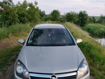 Сірий Опель Астра, об'ємом двигуна 1.8 л та пробігом 236 тис. км за 7041 $, фото 1 на Automoto.ua