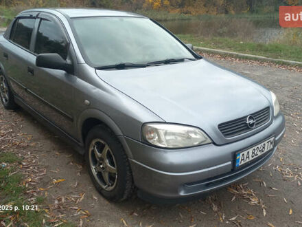 Серый Опель Астра, объемом двигателя 1.4 л и пробегом 212 тыс. км за 3900 $, фото 1 на Automoto.ua