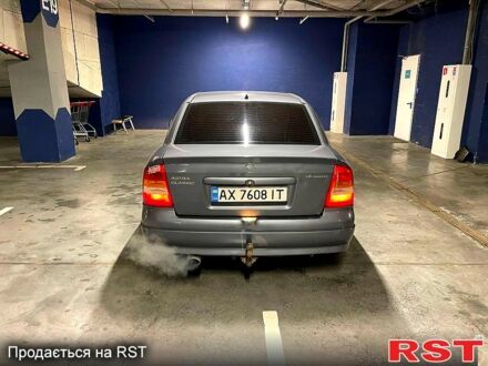 Серый Опель Астра, объемом двигателя 1.4 л и пробегом 263 тыс. км за 2700 $, фото 1 на Automoto.ua